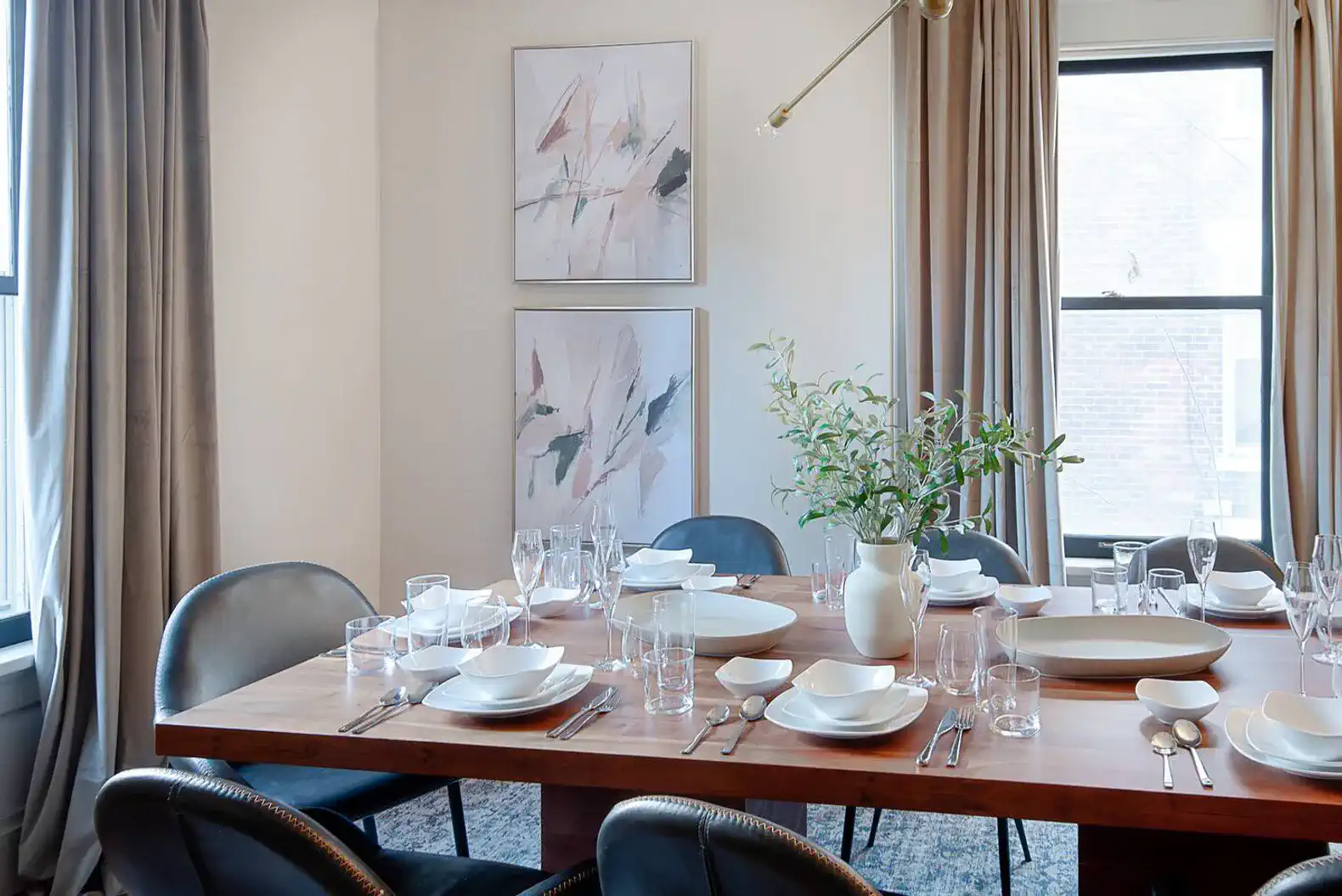First Floor | Dining Room | Plateware, dishes and settings for 12 people with serving trays, wine glasses, champagne glasses, beer glasses, etc