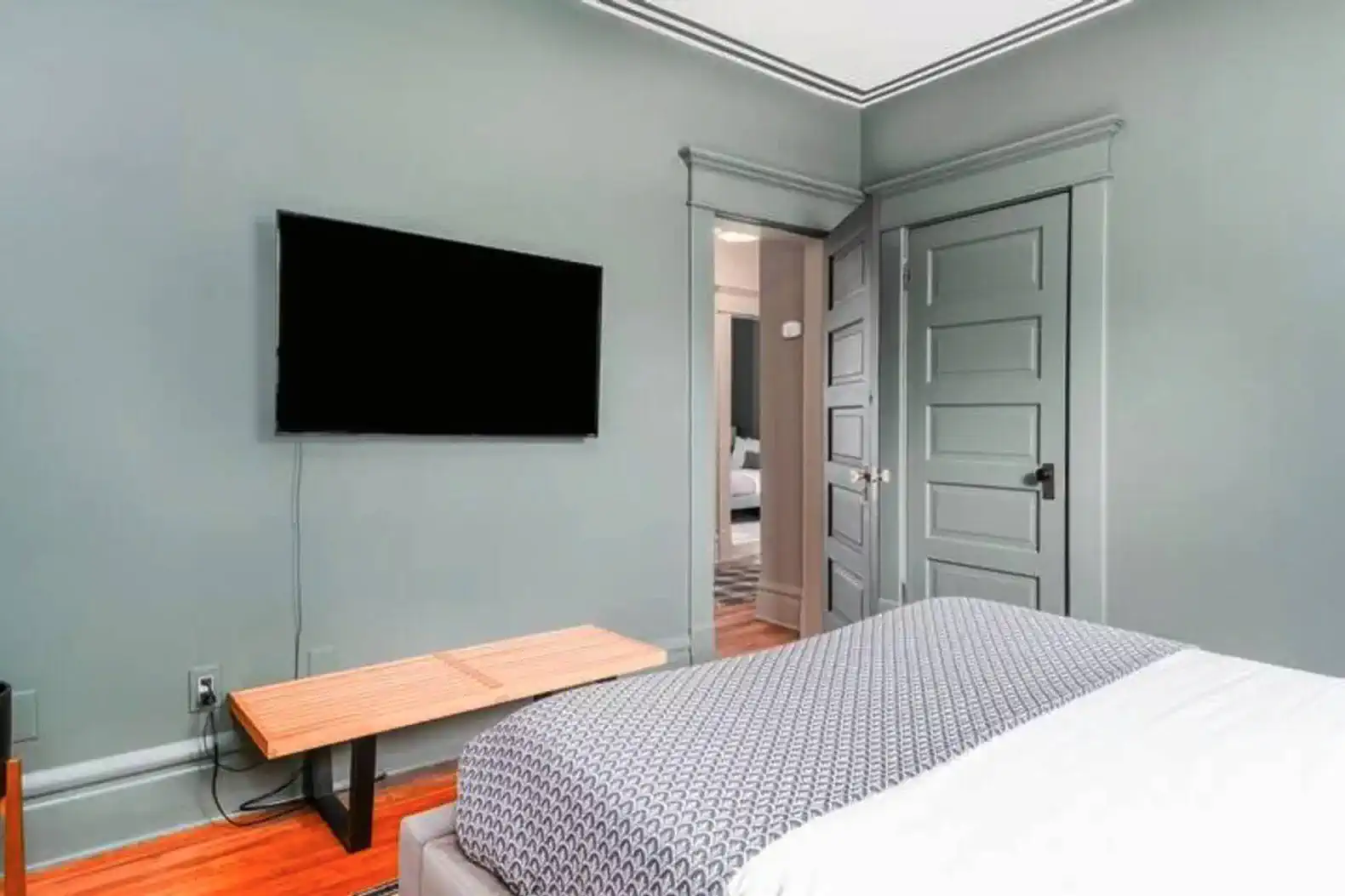 Second Floor | Bedroom 5 | Queen bed, TV, closet with hangers and luggage rack