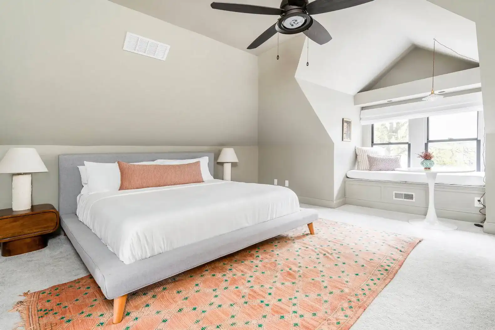 Third Floor | Primary Suite | Master bed, twin day bed, bistro table sitting area, bathroom  ensuite