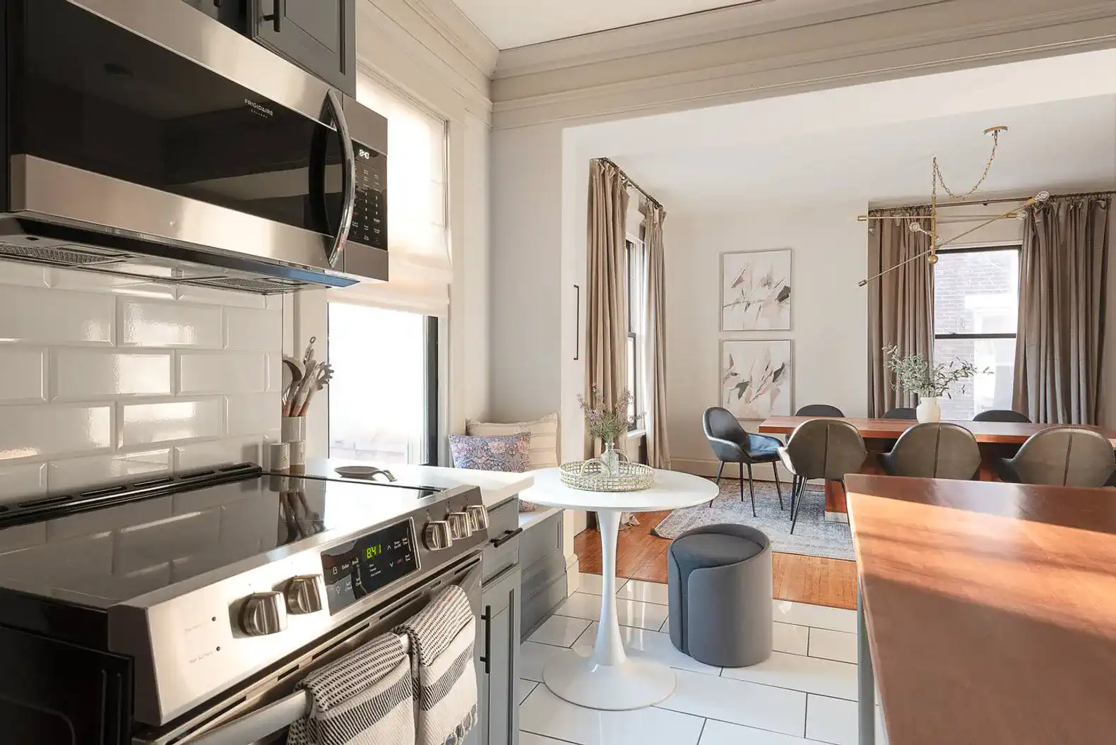 First Floor | Fully Stocked Kitchen with a Breakfast Table | Looking into Living Room 
