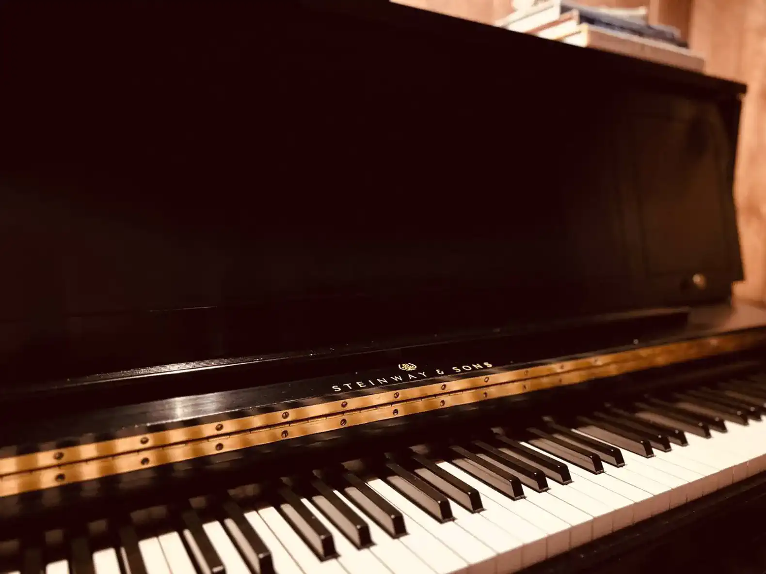 Close-up of a Steinway piano showcasing its elegant keys and polished finish