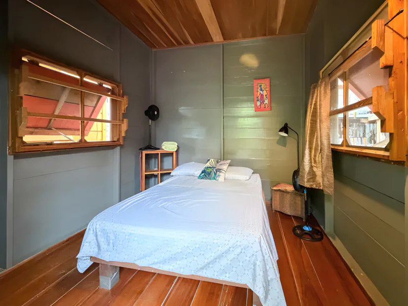 Queen bed in the Orange Bungalow