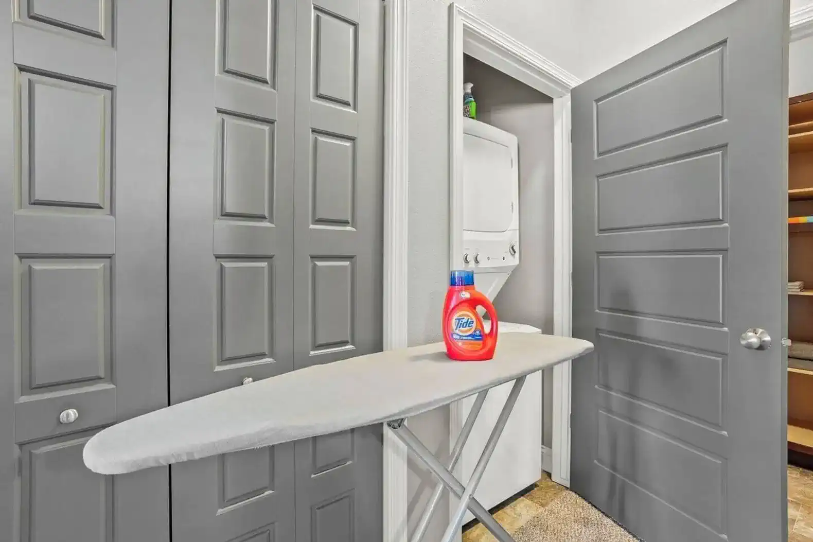 Around the corner is the full-size washer, dryer and all the laundry supplies you'll need during your stay.