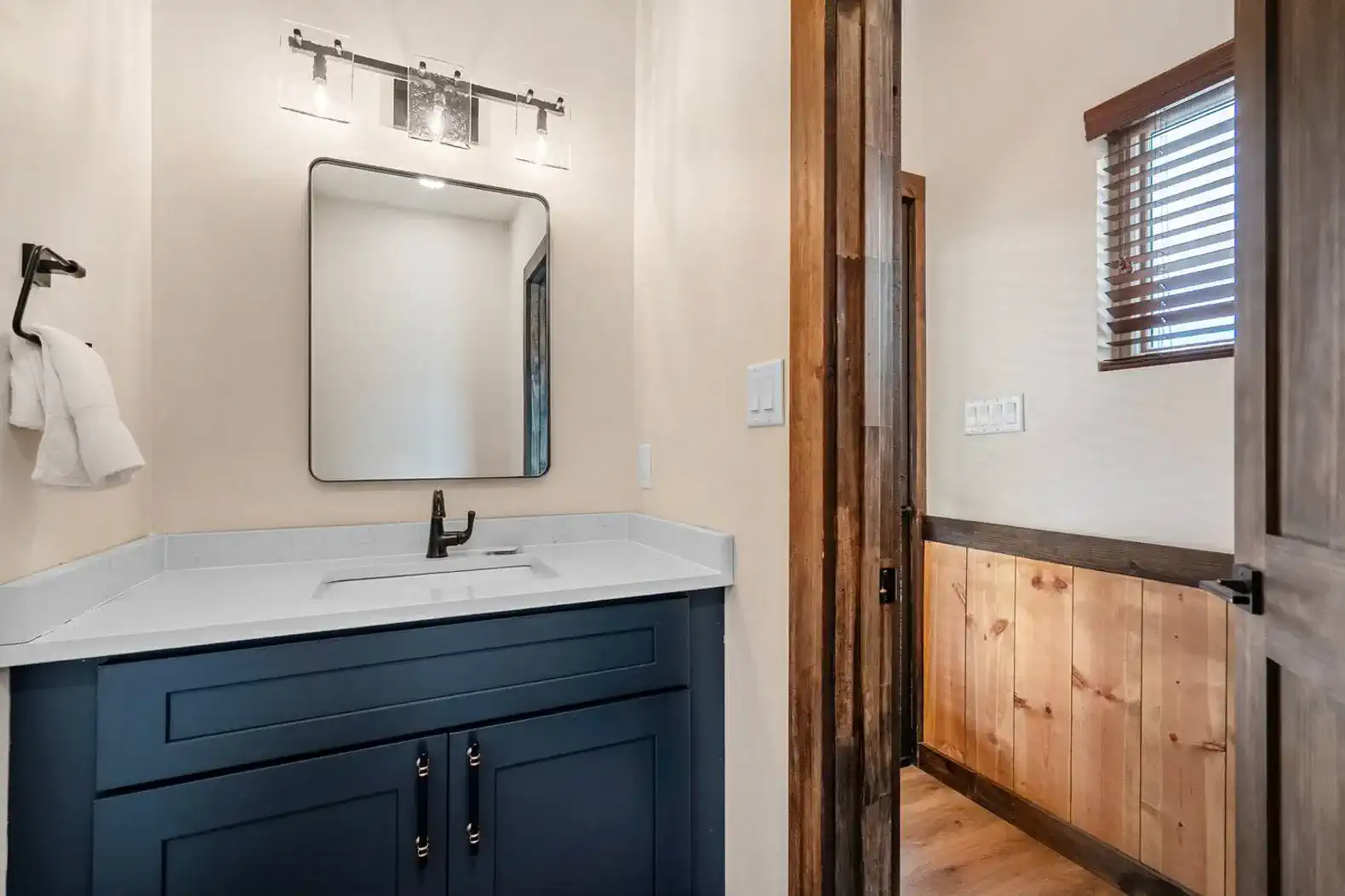 Modern bathroom with a sleek vanity and mirror