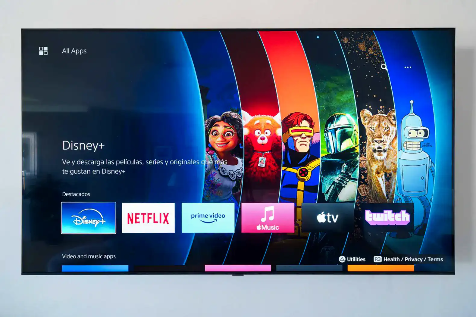 Smart TV displaying various streaming apps including Disney+, Netflix, and Prime Video