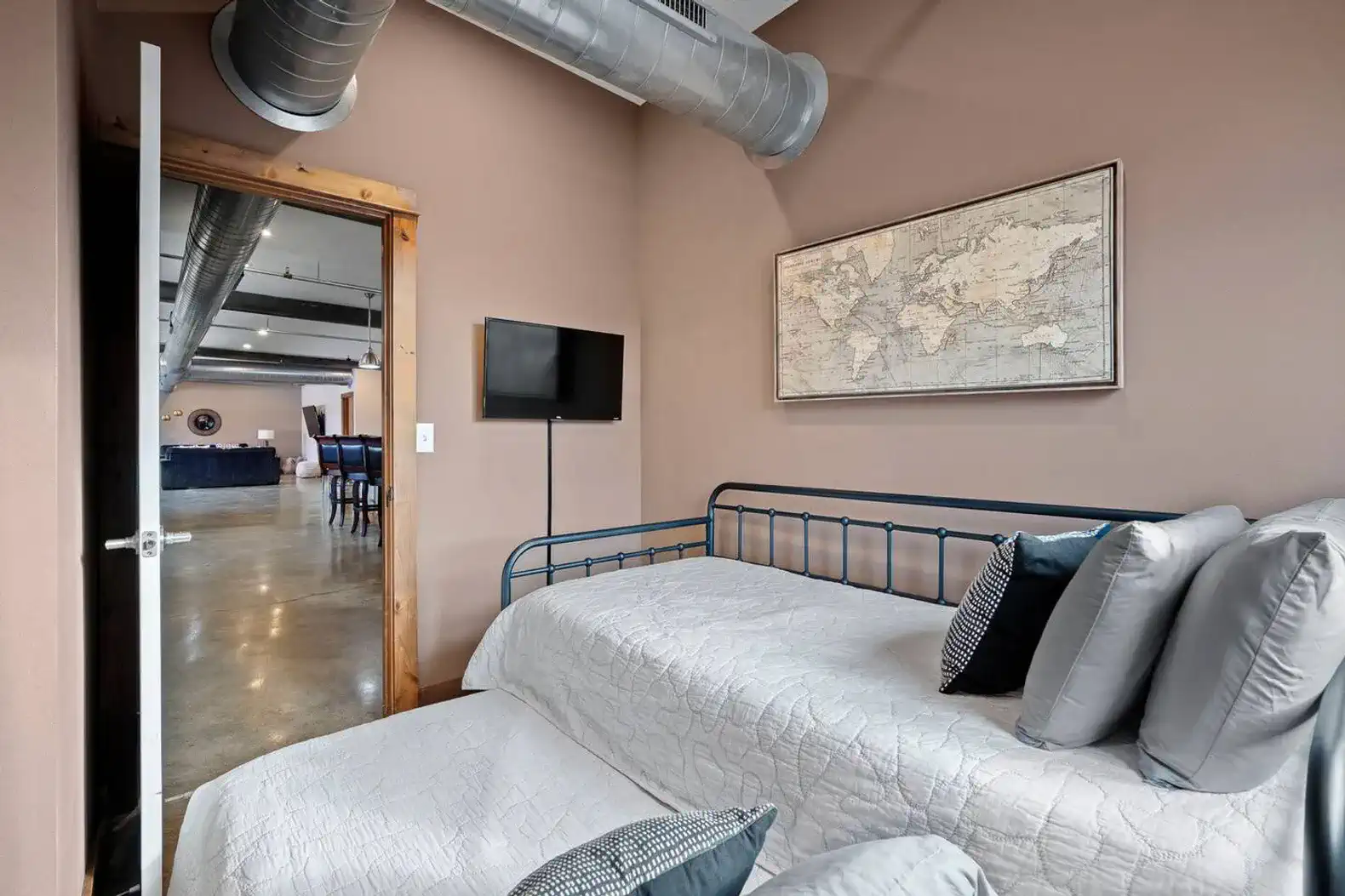 This bedroom also has a smart TV.