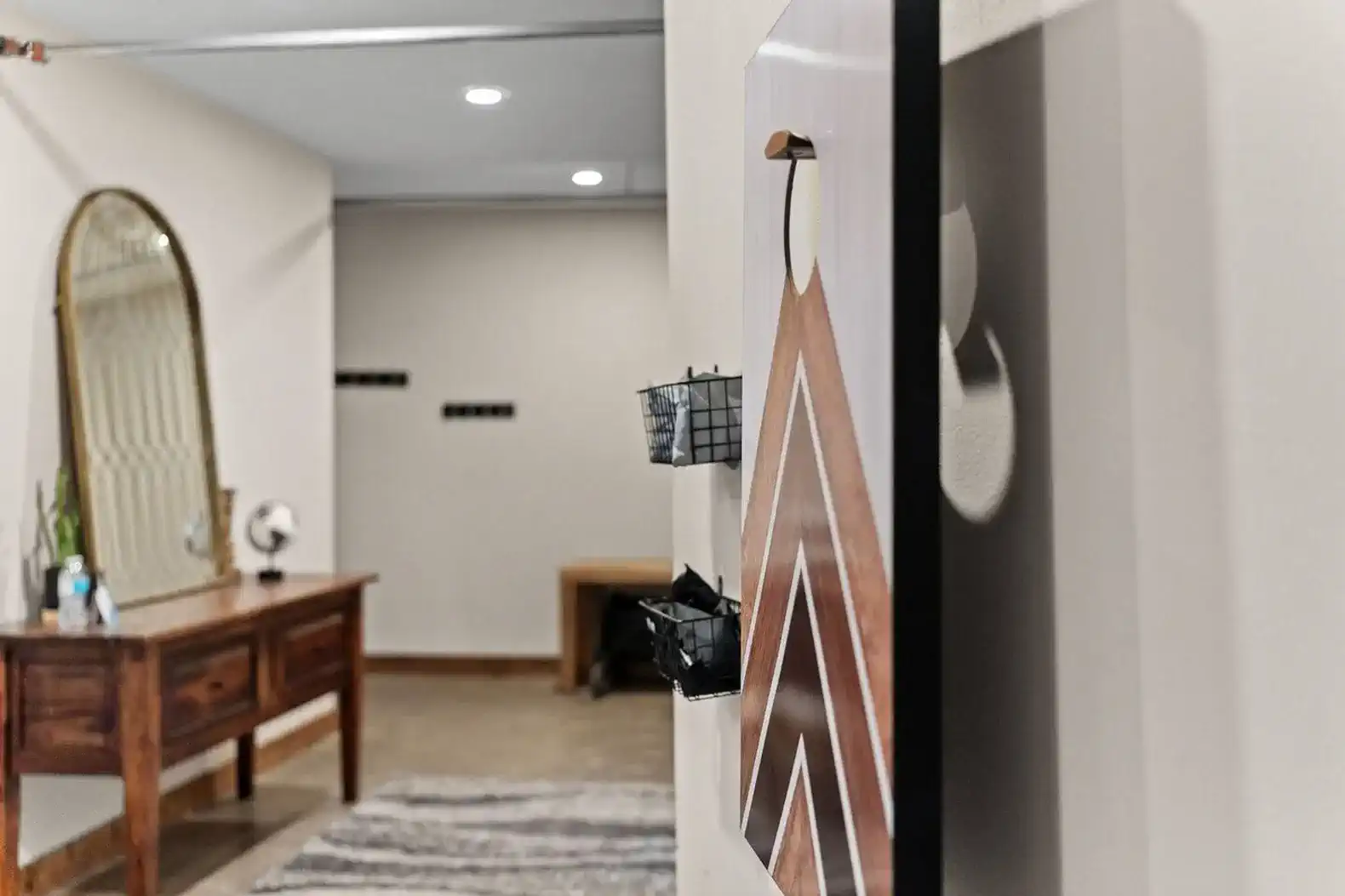 In the entry, you'll find the cornhole boards/bags and other conveniences to enhance your stay.