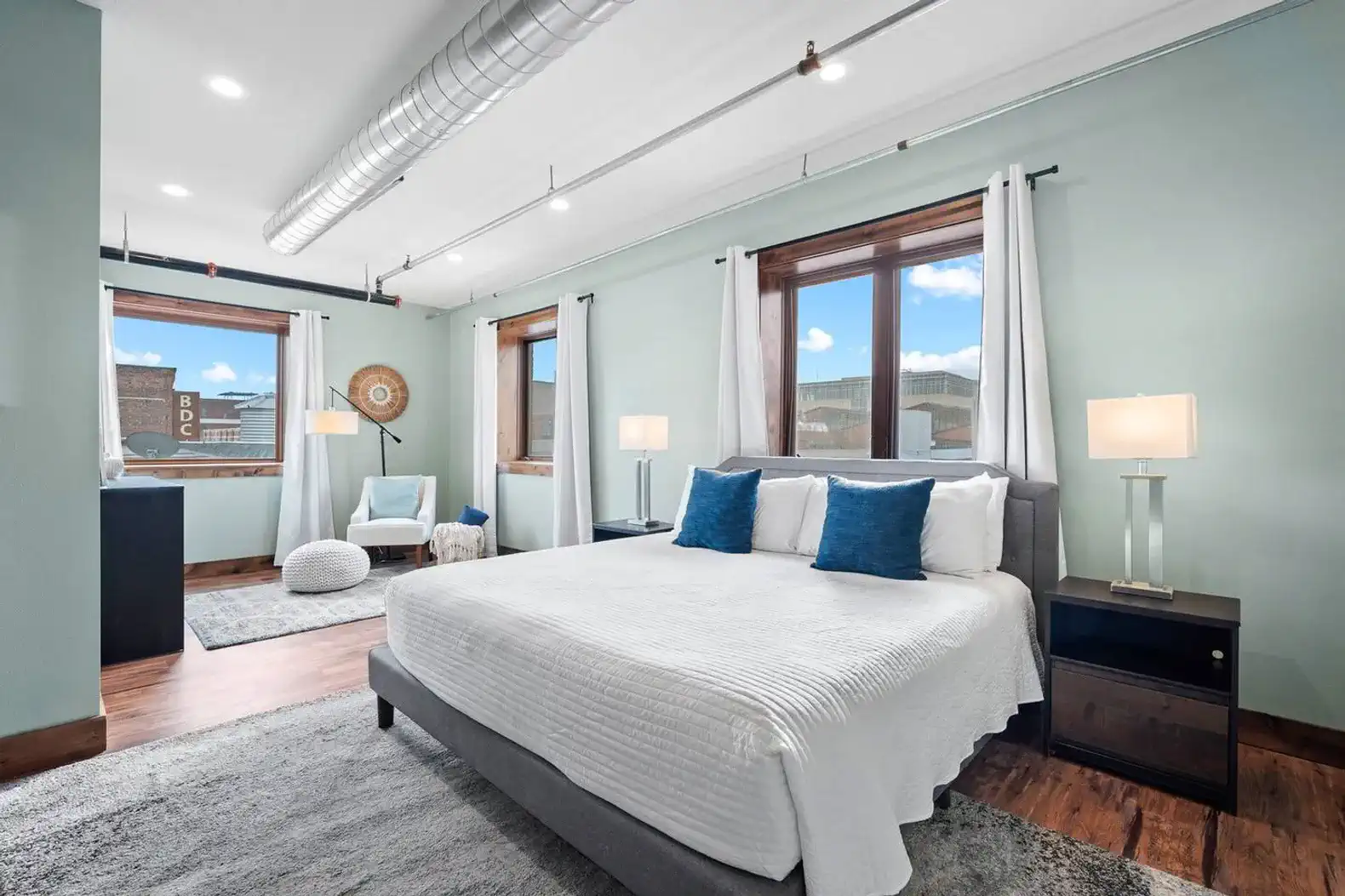 The primary suite with tons of natural light and room darkening curtains.