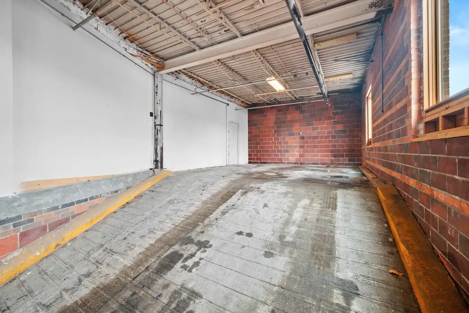 Private, enclosed parking is included for one vehicle (possibly more, depending on their size) with direct access to the property.