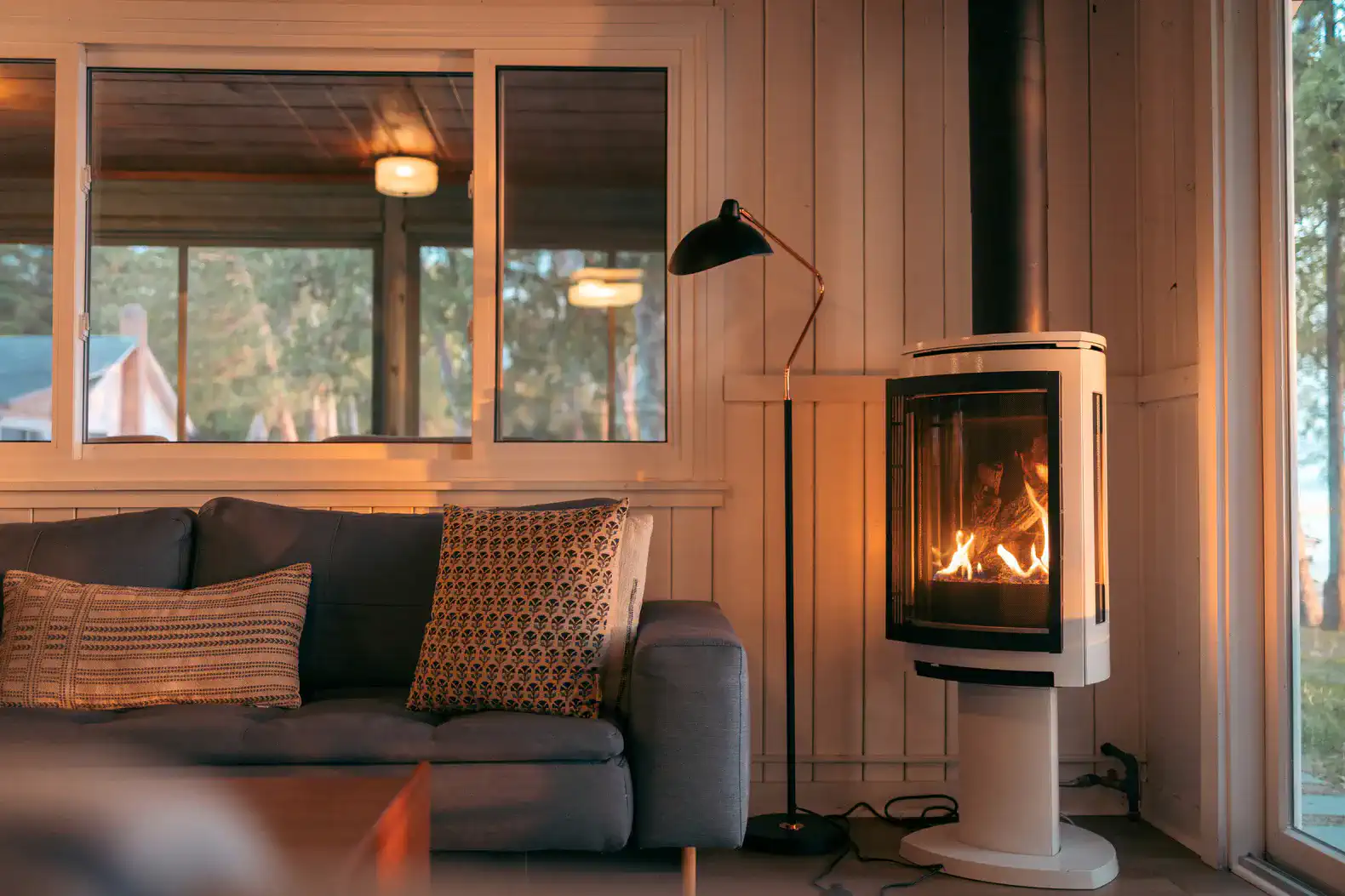 Cozy living room with a modern fireplace and comfortable sofa