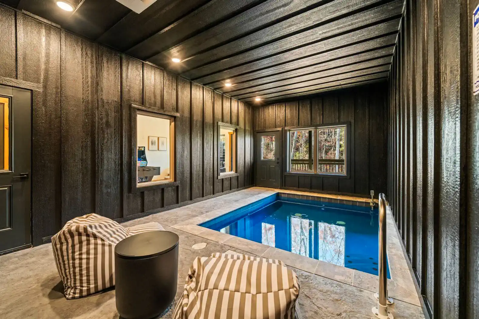 Private hot tub | Three king suites | Wooded views