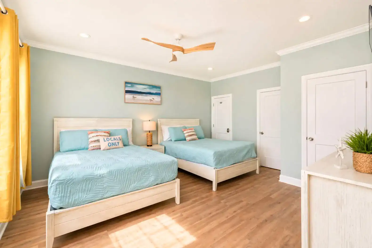 Comfortable Queen Bedroom on Upper Level.  Has private En Suite with double vanity and lockout to toilet/shower for additional areas to get ready.  