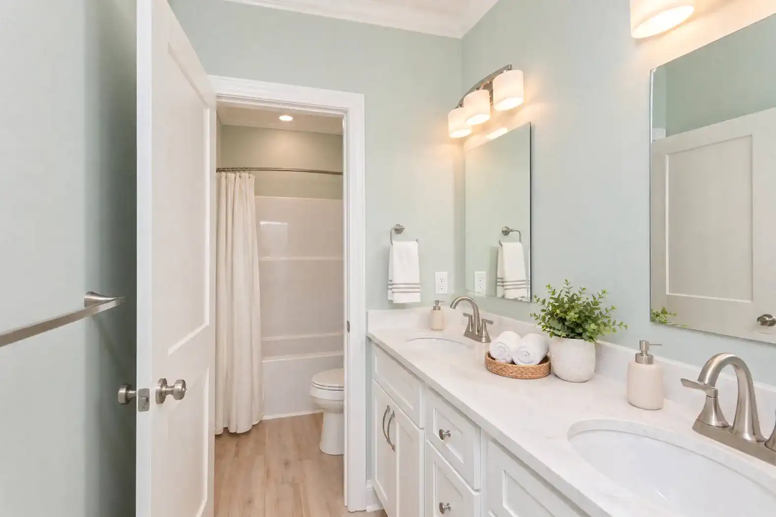 Bunk Room Bathroom.  Lockout door to Double Vanity provides privacy while others are able to get ready.