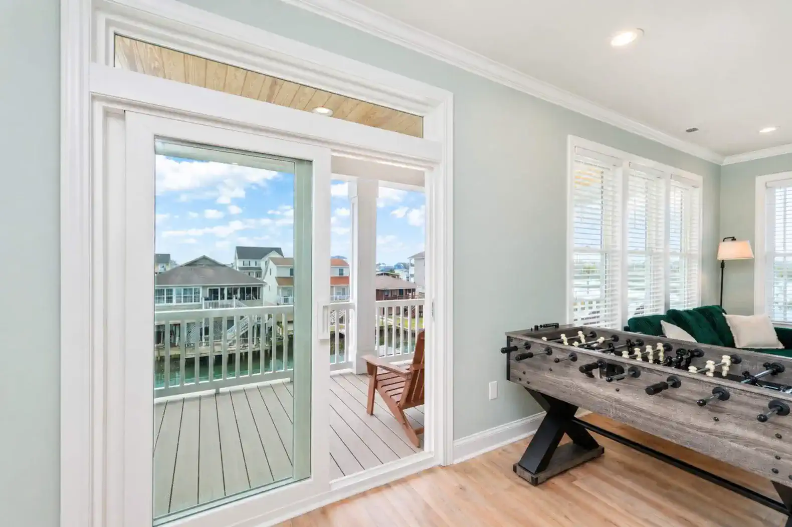 Balcony overlooking pool off Game Room