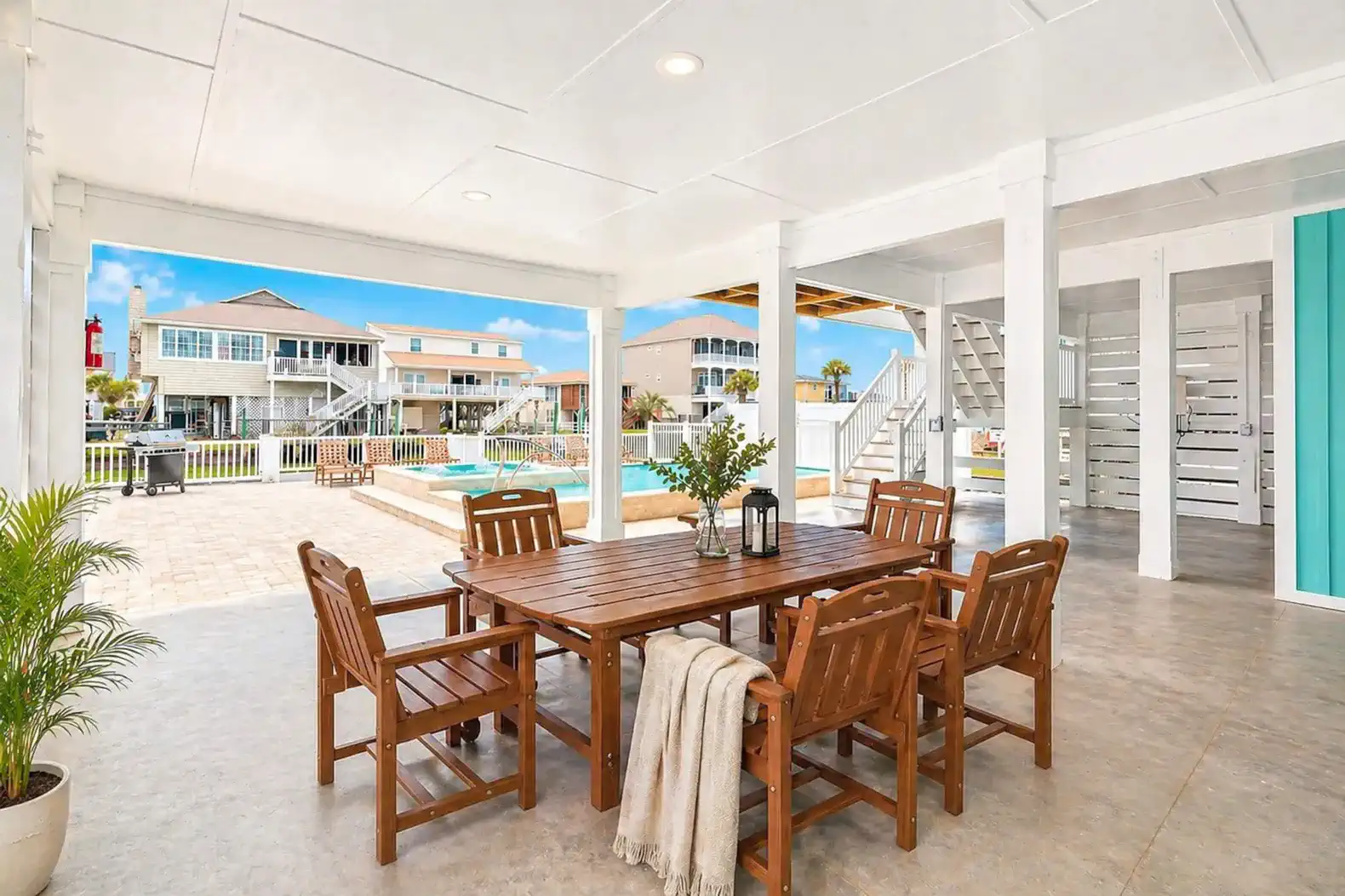 Table and Chairs under house