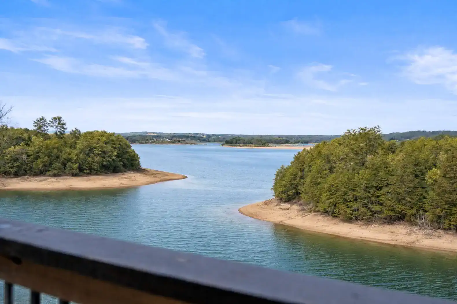 Lake View: Gorgeous views off of the main level back deck. (this is a seasonal image! Please see the listing description for more information)