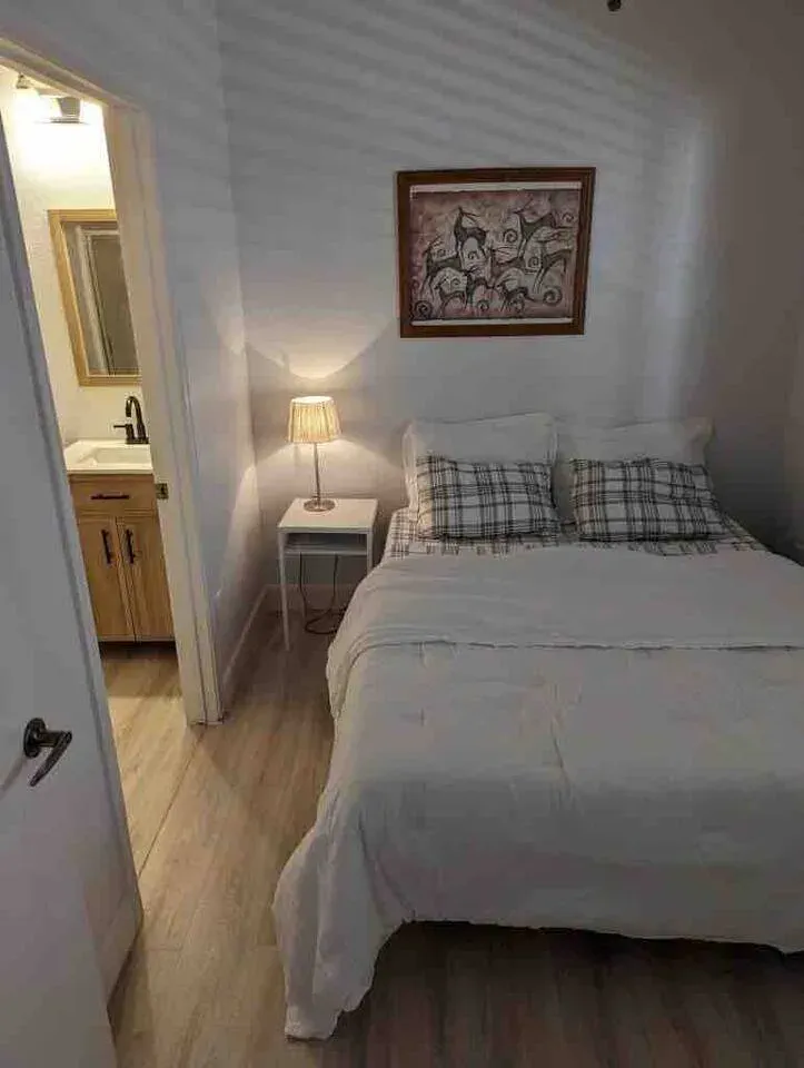 Small Bedroom with attached bathroom.