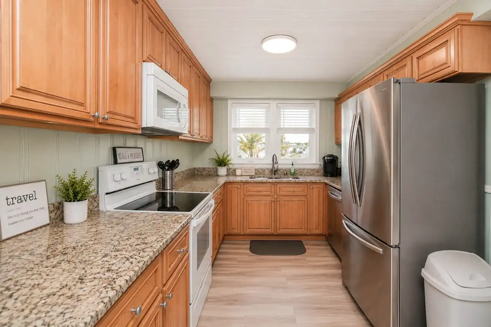 Modern kitchen with granite countertops and stainless steel appliances