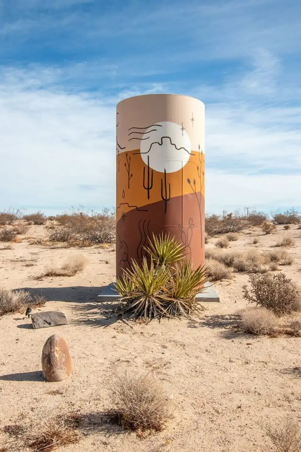 water tower + mural by desert artist Prescott McCarthy