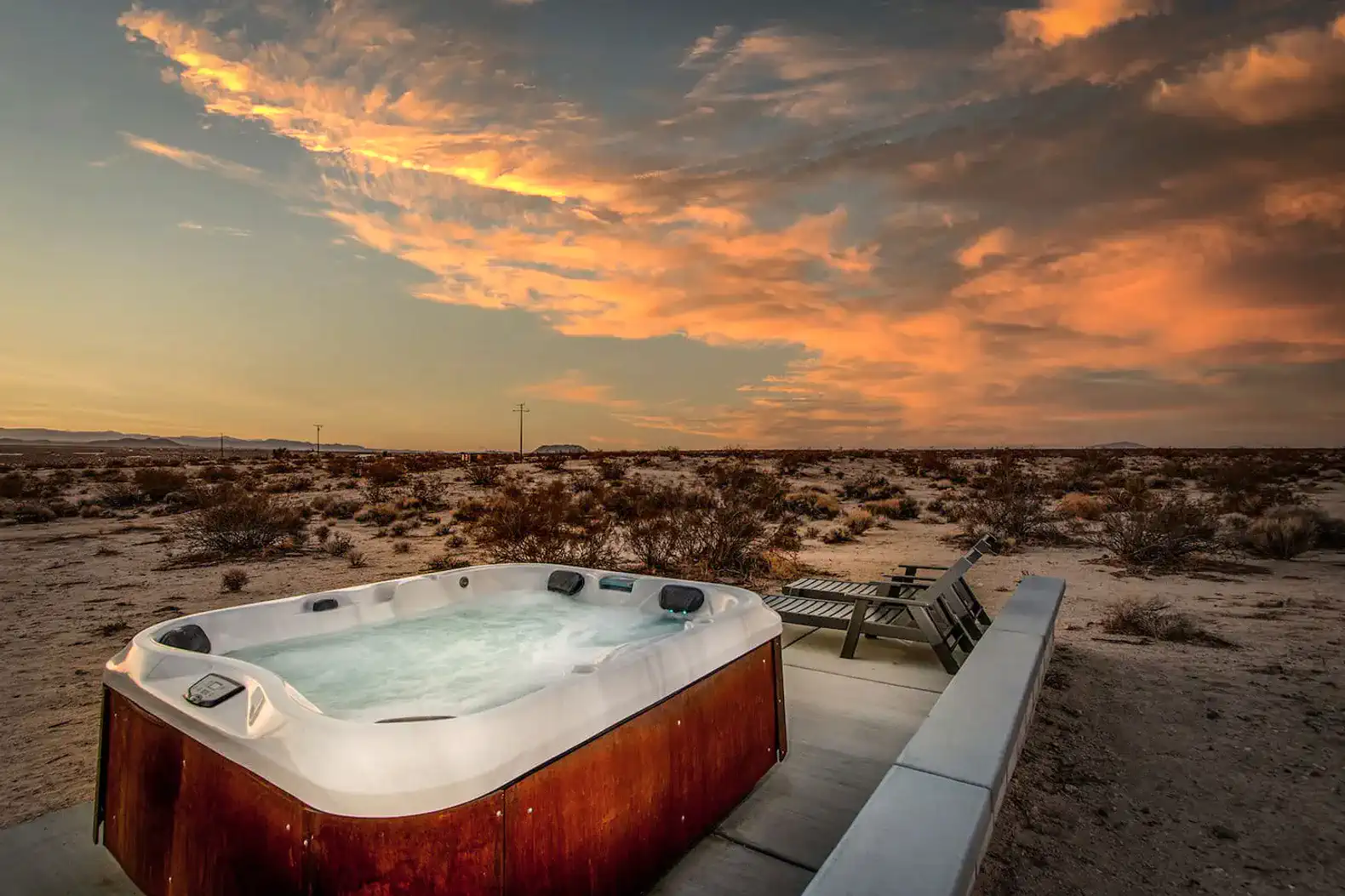 jacuzzi pad and lounge chairs