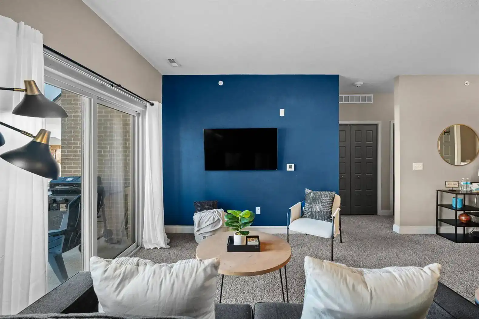 The living room has tons of space, light and is the perfect place to relax and unwind!