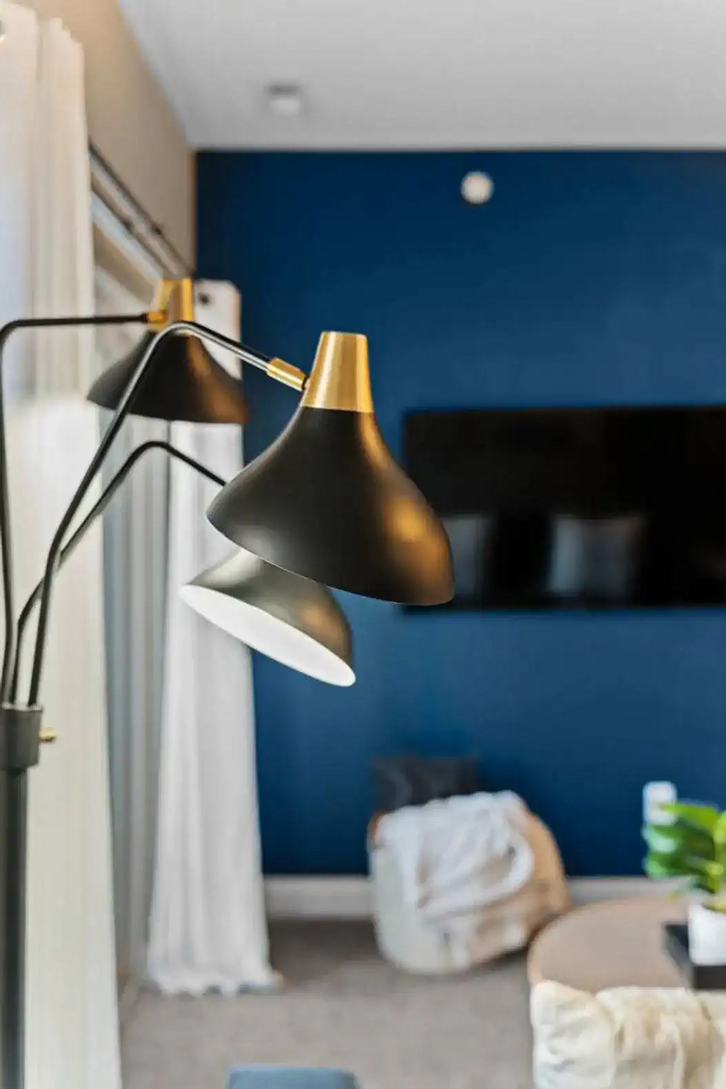 Design-forward details throughout, including upgraded lighting and a bold accent wall—small touches that elevate the space and set this unit apart from standard rentals.