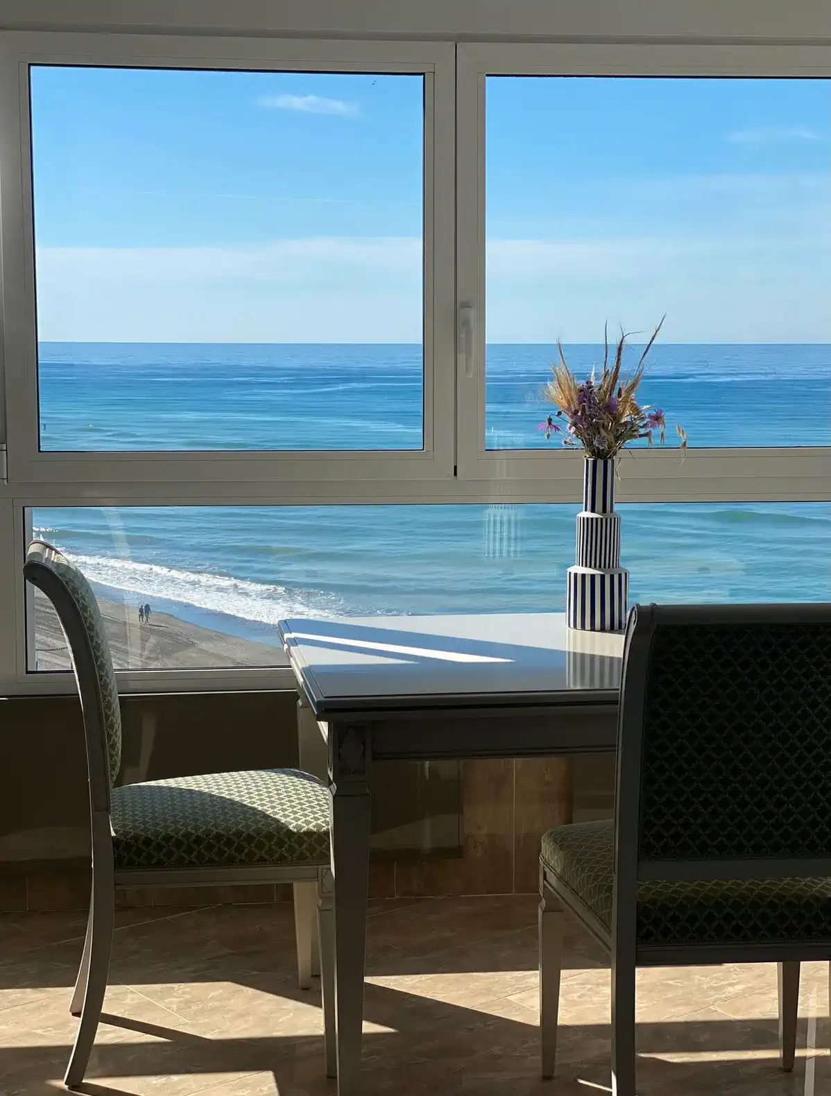 Dining area with a view of the beach and ocean