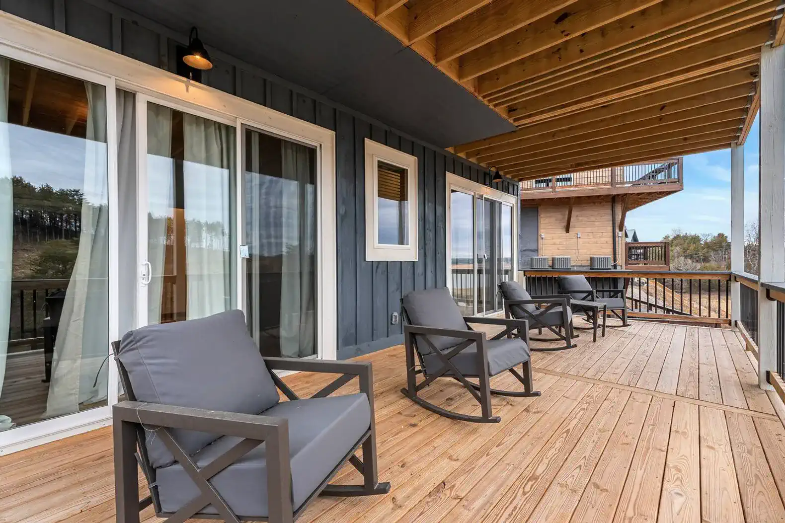 Spacious deck with comfortable seating and scenic views
