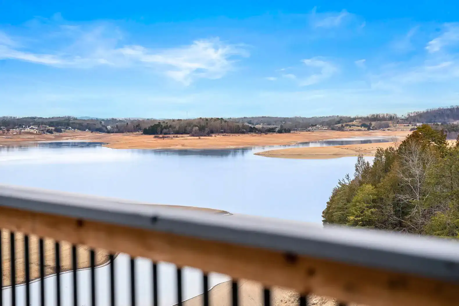 Stunning view of the serene lake and surrounding landscape