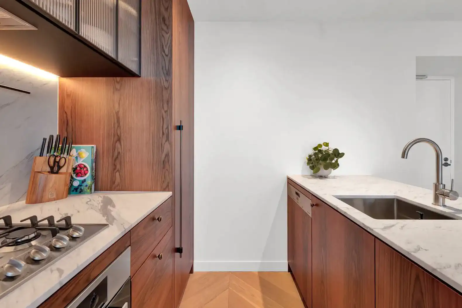 Modern kitchen with sleek cabinetry and stainless steel appliances