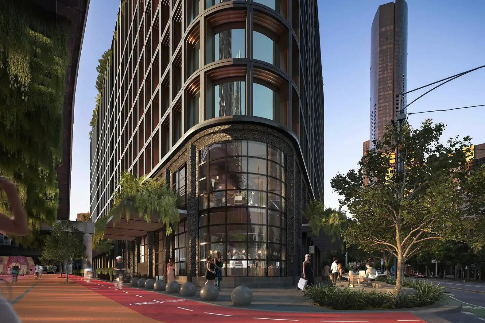 Modern building exterior with large windows and greenery