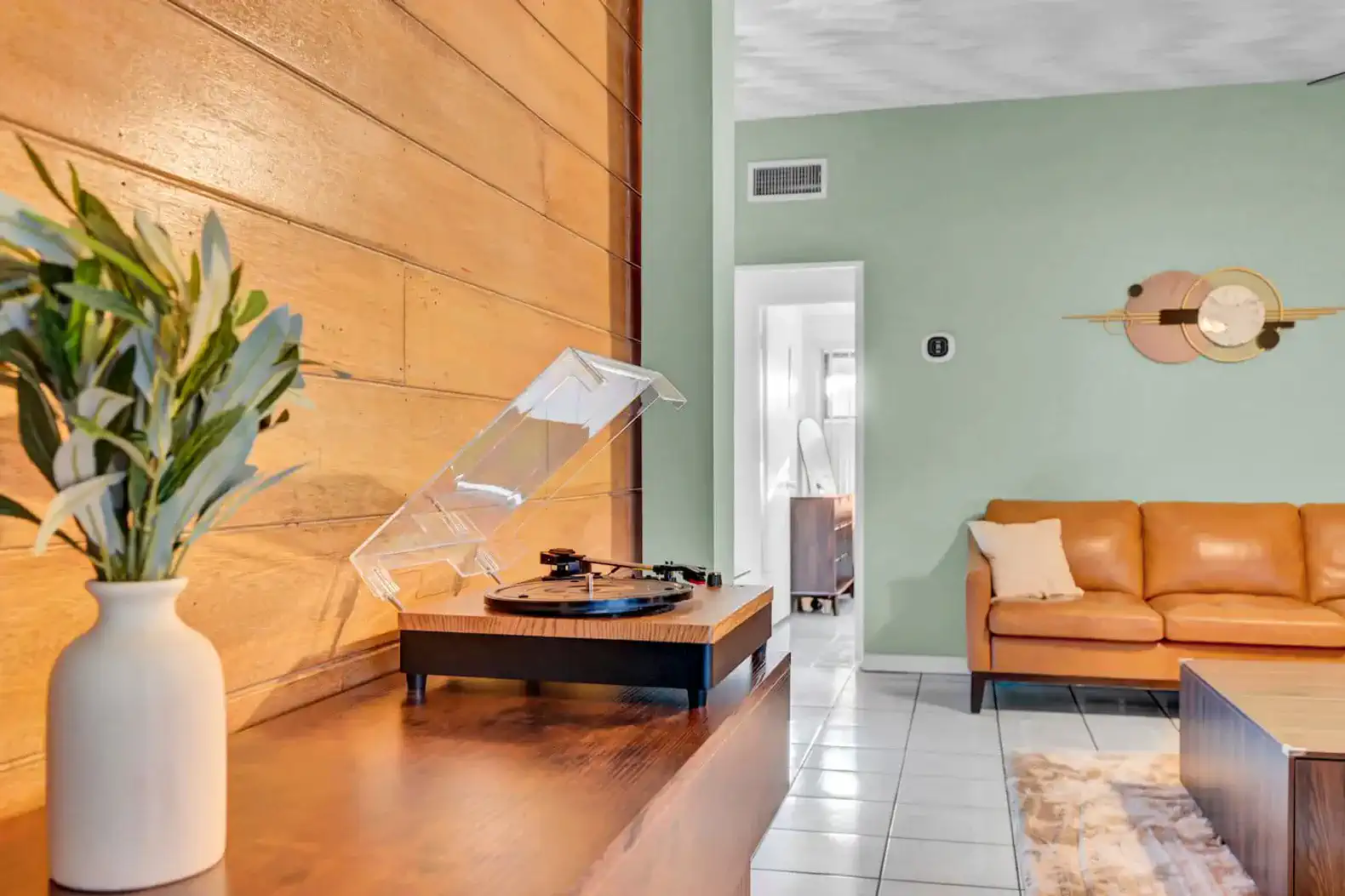 Stylish living room with a record player and modern decor