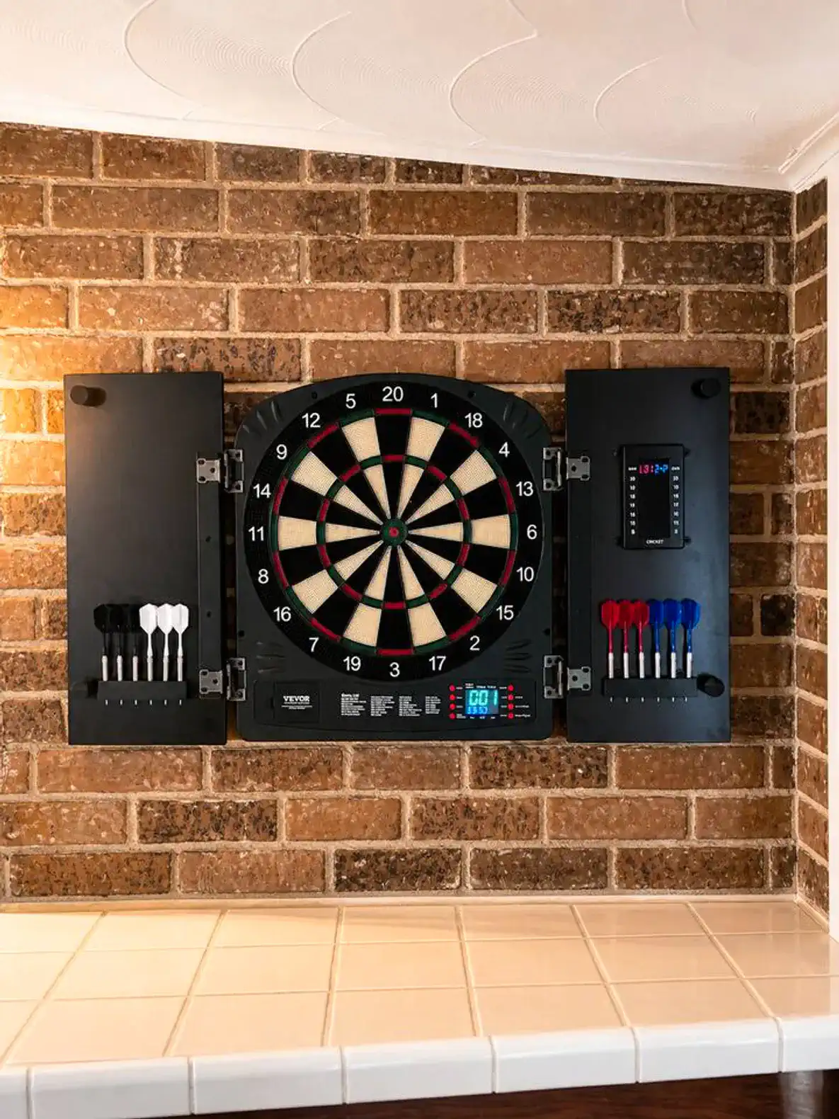 Dartboard mounted on a brick wall with darts organized on either side