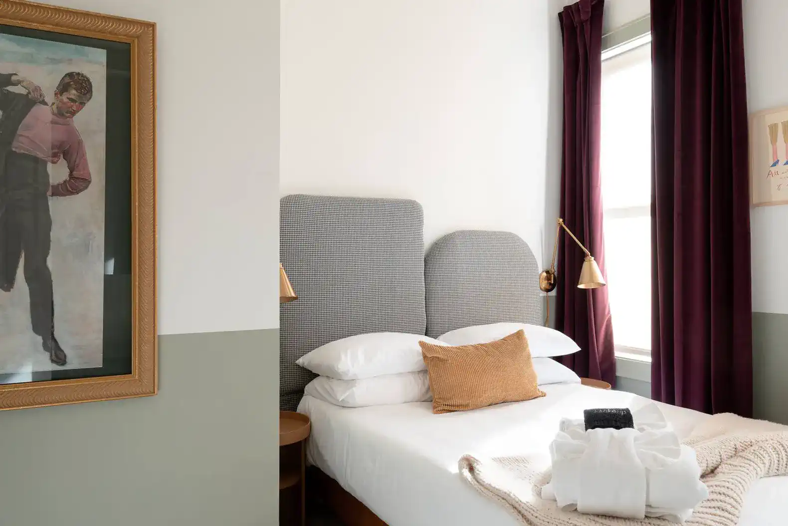 Cozy guest bedroom with modern decor and artwork