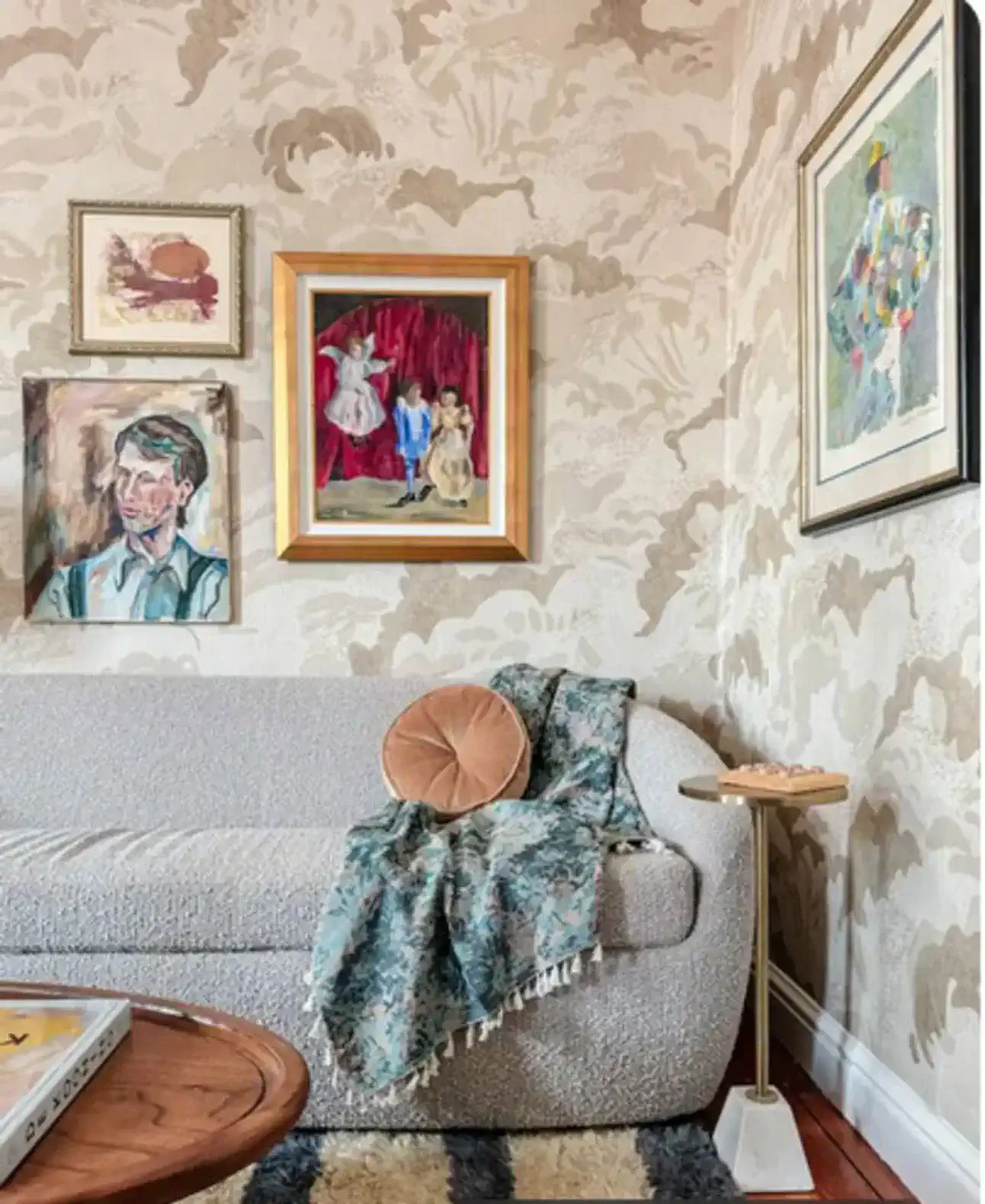 Cozy living room with artistic decor and a textured sofa