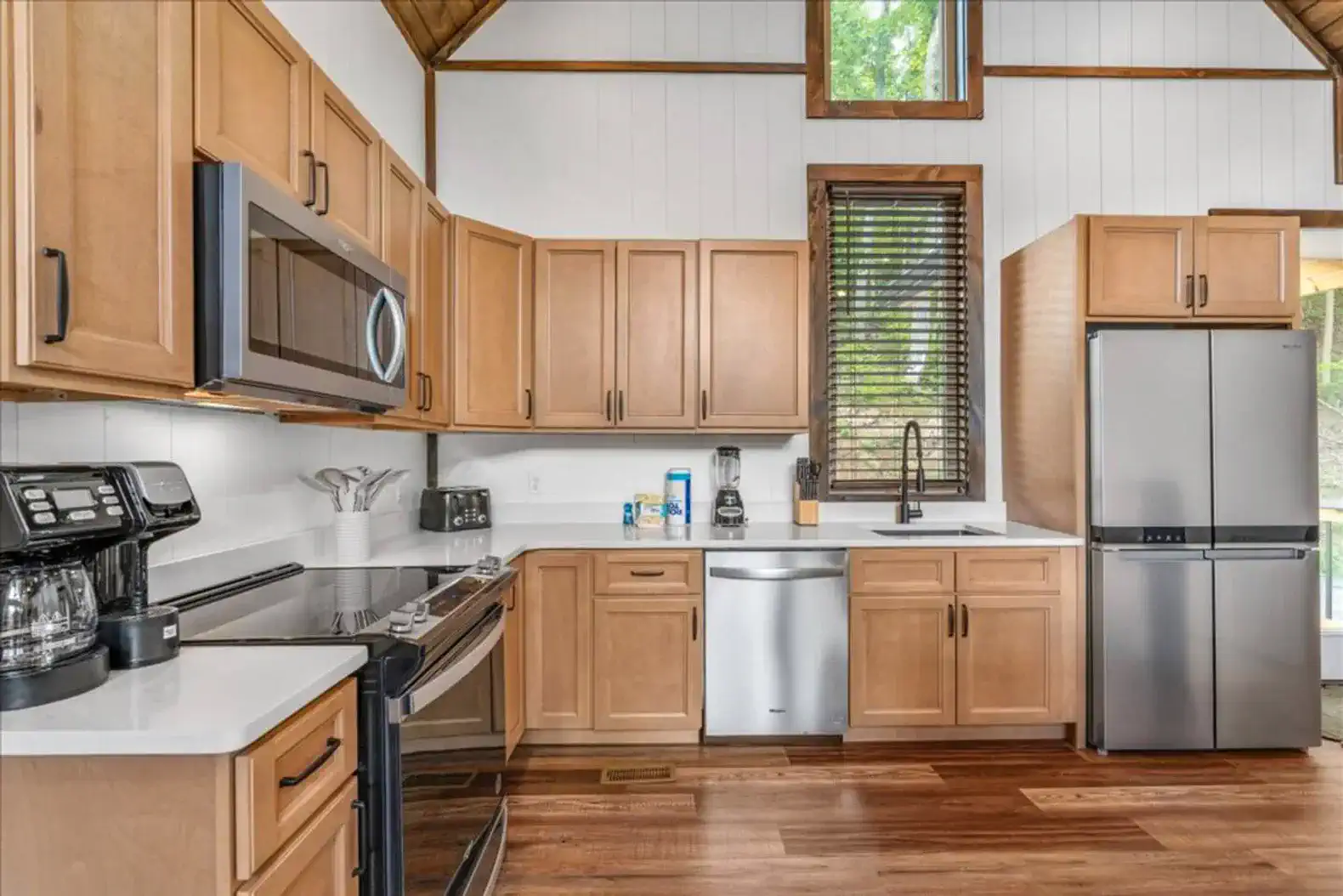 This kitchen if fully stocked and ready to aid you in cooking for you and your group.