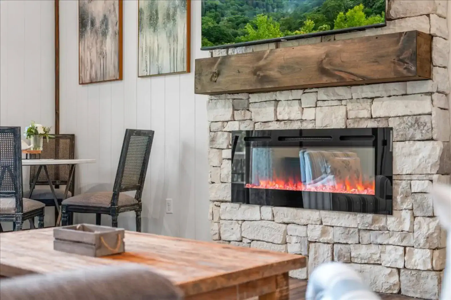 Use the electric fireplace to add ambience and keep things cozy