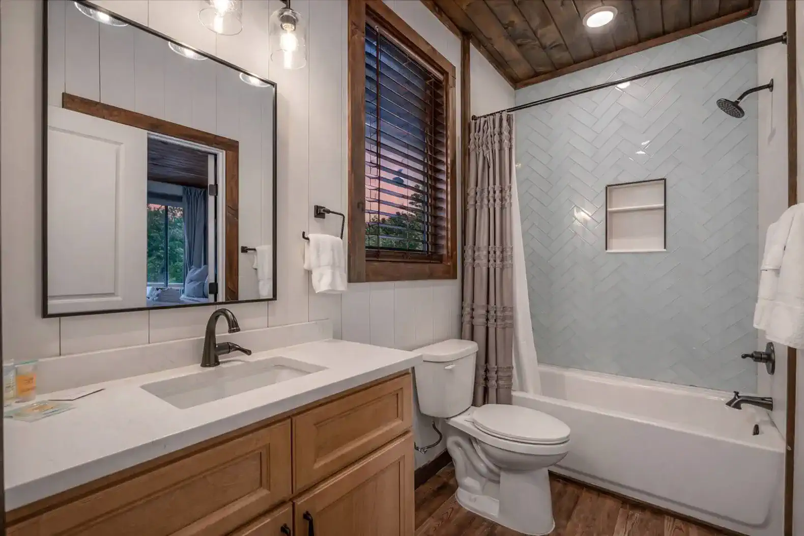Primary ensuite to the king suite located on the main level.