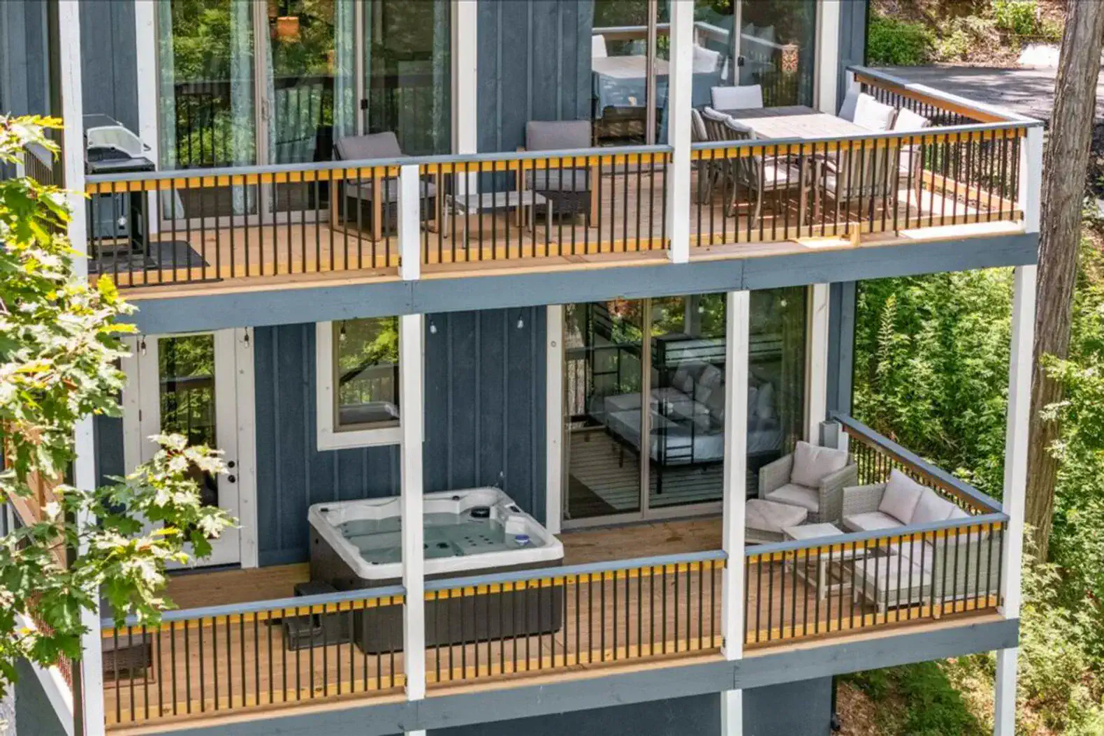 Main level and lowest level back deck view. 