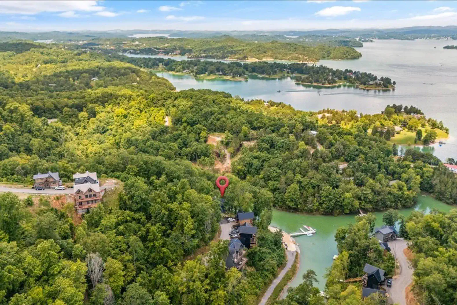 Aerial view of Lake Douglas surrounded by lush greenery and homes