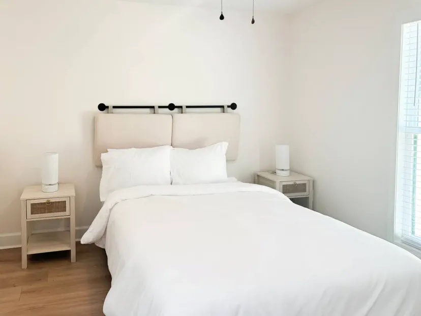 Cozy guest bedroom with a double bed and bedside tables