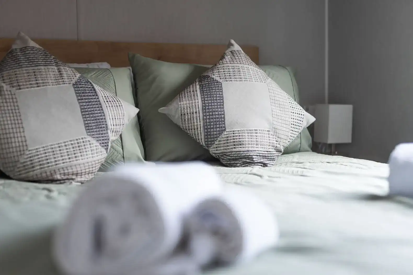 Settle into a comfortable double bed topped with premium linens for the ultimate night's sleep. Enjoy a clutter-free, relaxing sanctuary with a wardrobe and drawers to keep your space feeling like home