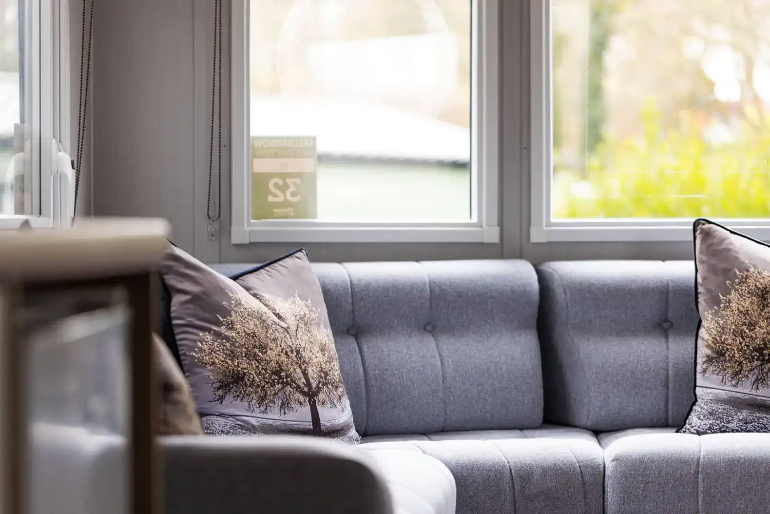 Unwind in our cozy living area, designed for ultimate relaxation after a day of exploring the Lake District. Relax on the sofa and watch TV in the warm glow of the electric fireplace