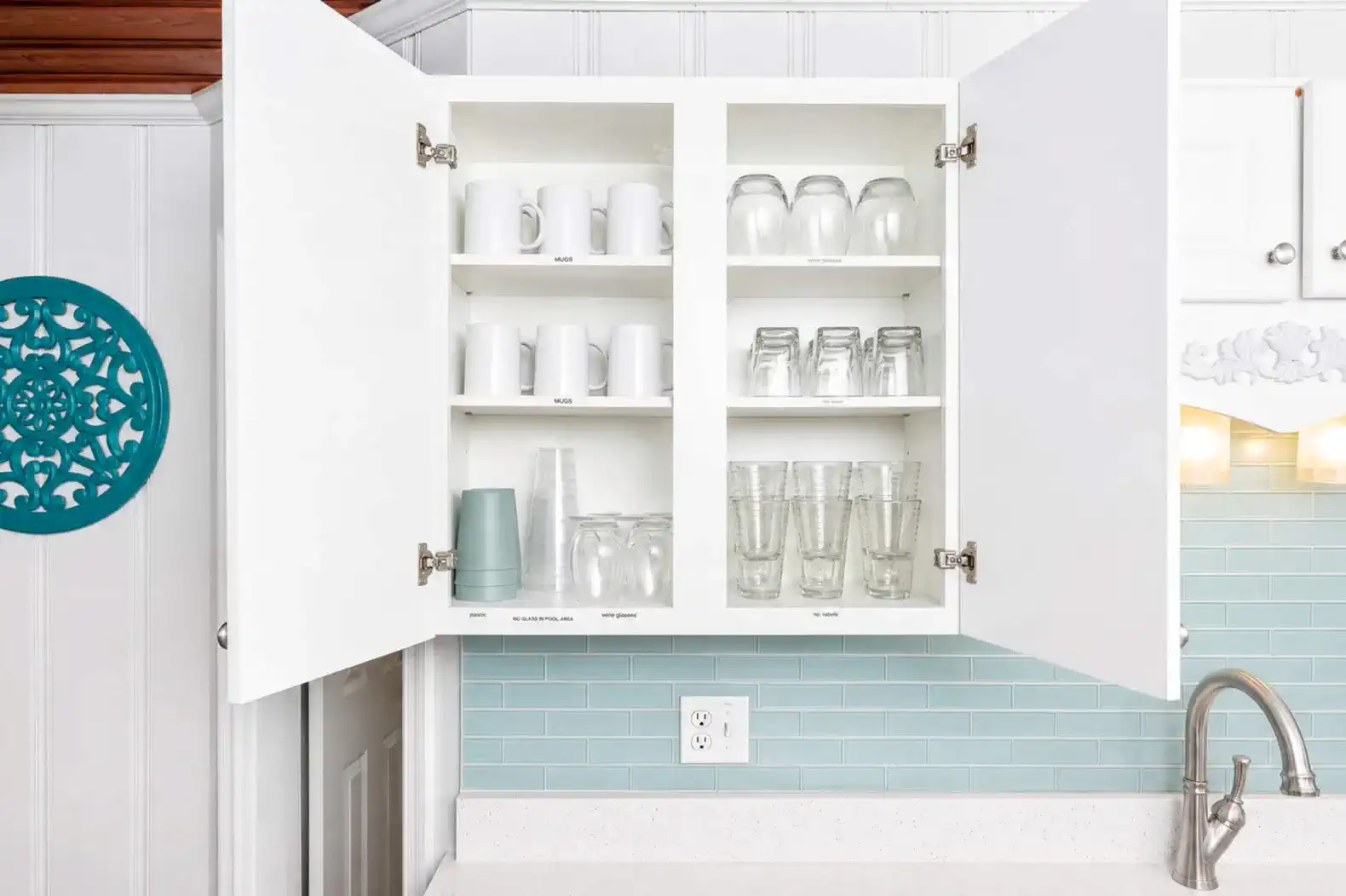 Plenty of plates, dishes, cookware for your stay.  It also has a Keurig and regular coffee maker.  