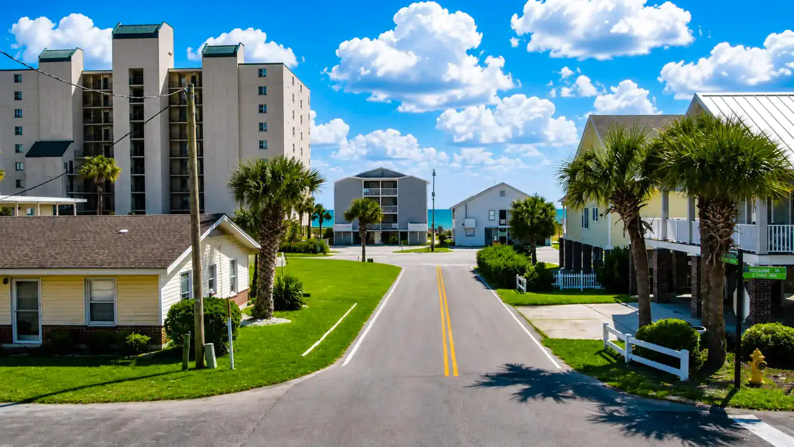 View of front of house to beach access.  Less than a minute walk