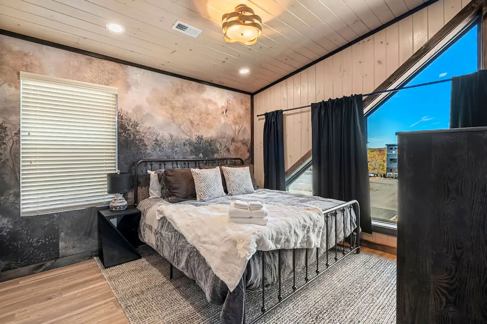 King suite with ensuite full bathroom! Designed with rustic roots and a modern twist so you can vacation in style. 