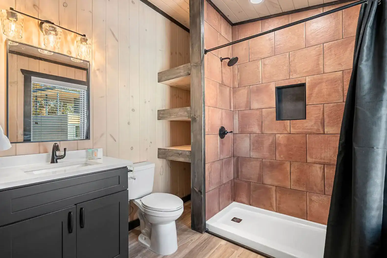 Second King ensuite located on the second level. Full bath with soap and linens ready for your stay. 