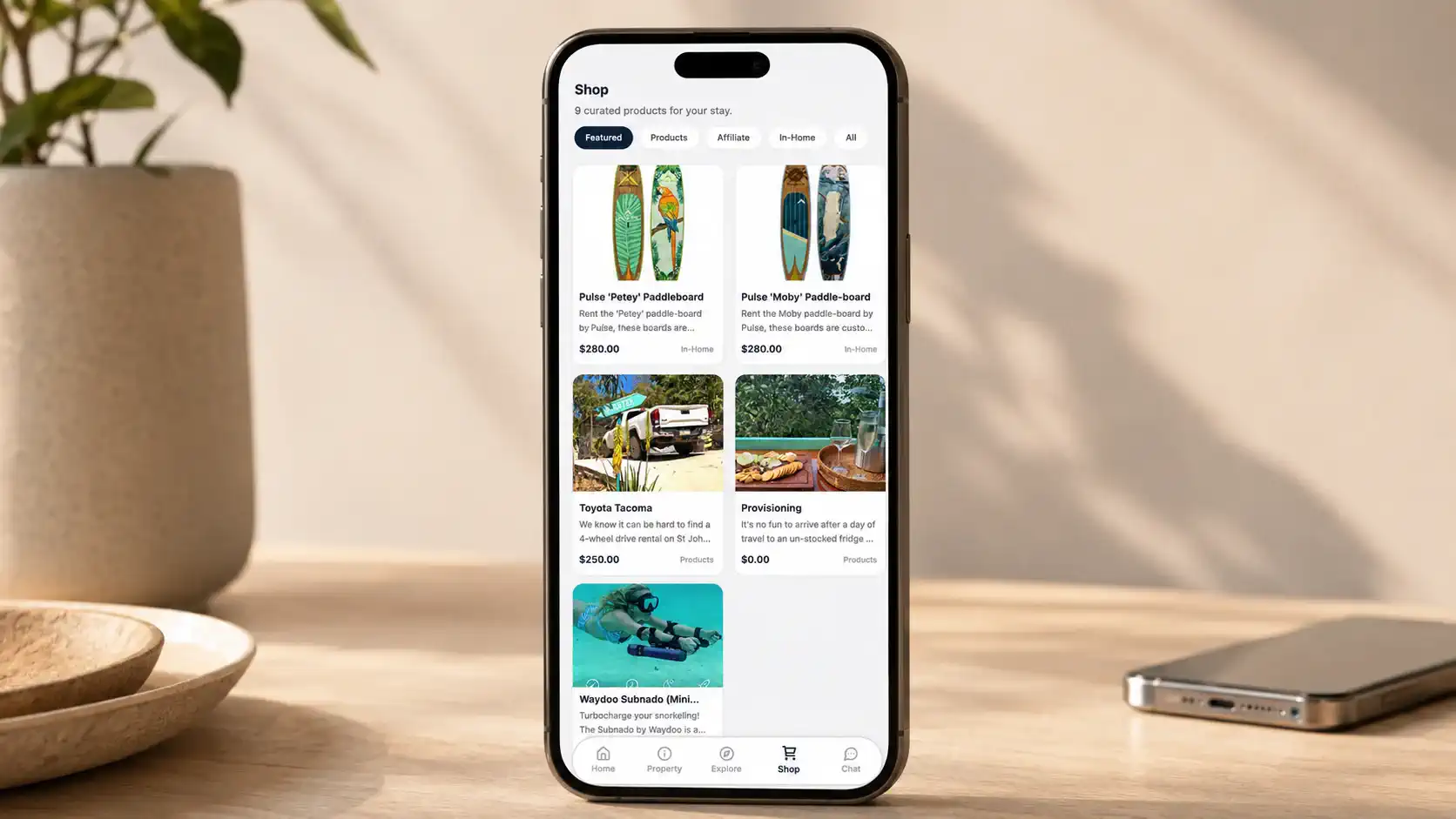 Haven guest app on a phone displaying the Shop tab with curated products