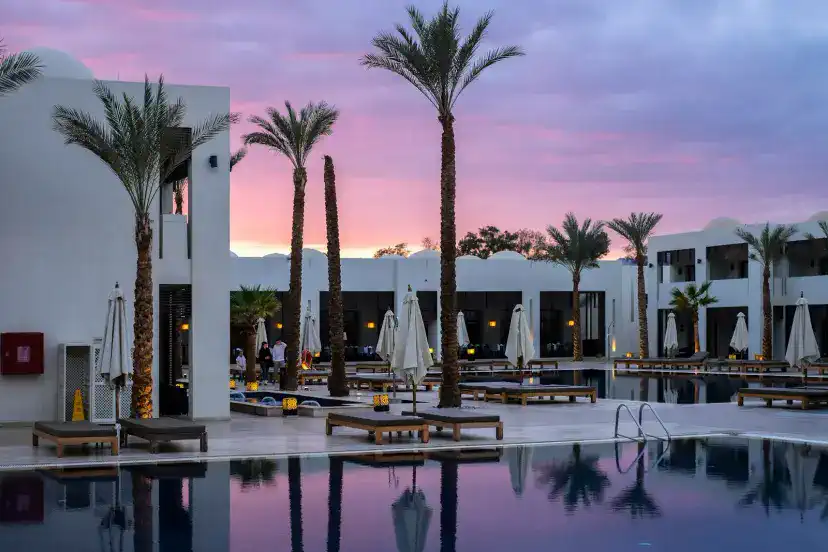 Professional exterior photo of a vacation rental at dusk