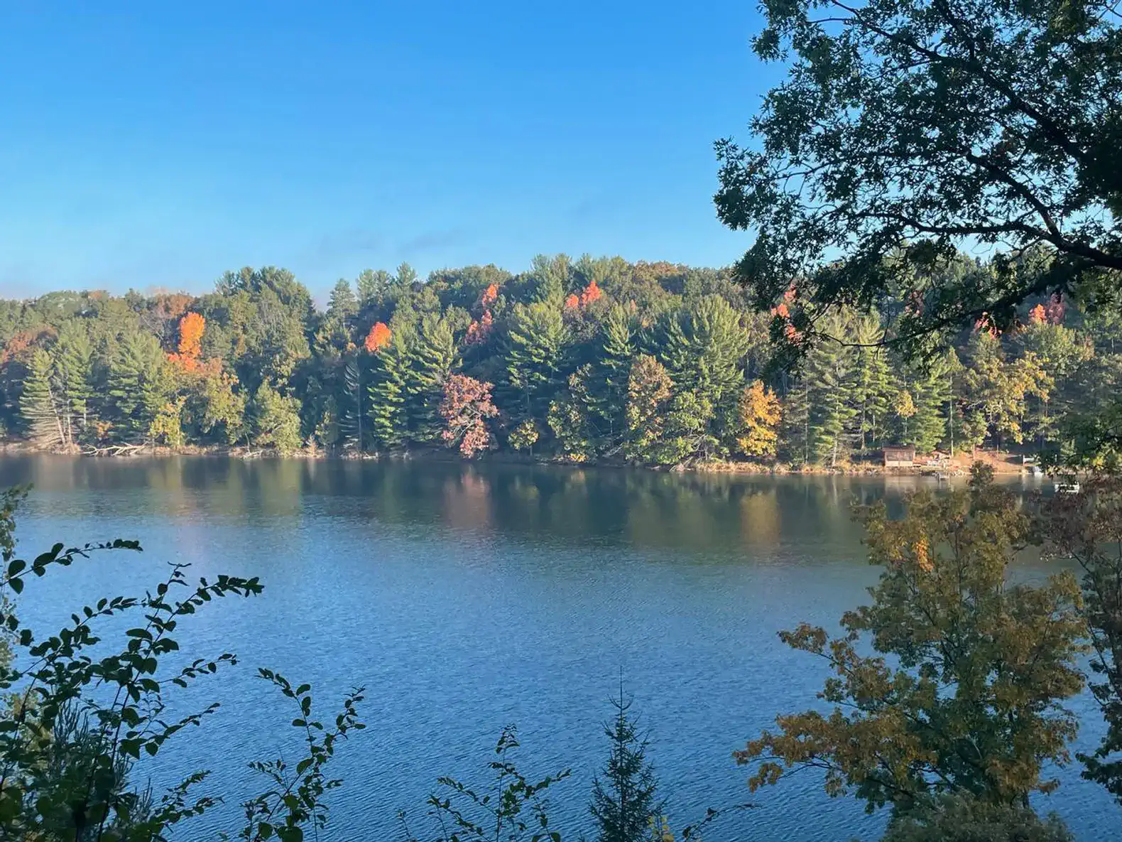 This is the view from the lower level veranda. Enjoy the beginning of fall colors from the hot tub.